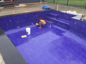 Man-furnishing-the-pool - Pool & Spa in Kuranda, QLD