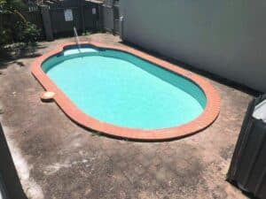 Refreshing Pool In A Fenced Yard — Tropical Prestige Pools in Kuranda, QLD