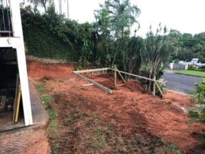 Rustic Dirt Yard Enclosed By A Wooden Fence — Tropical Prestige Pools in Kuranda, QLD