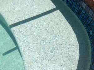 Refreshing Pool With Blue Tiles — Tropical Prestige Pools in Kuranda, QLD